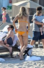 RITA RUSIC in Orange Bikini at a Beach in Miami