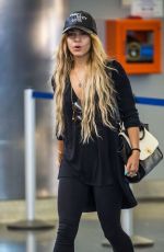 VANESSA HUDGENS Arrives at JFK Airport in New York