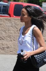 ZOE SALDANA Out Shopping at Melrose Avenue in Los Angeles