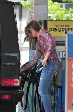 ABBIGAIL ABBEY CLANCY in Ripped Jeans at a Gas Station in London