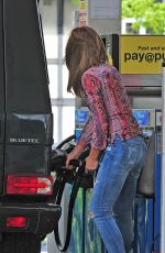 ABBIGAIL ABBEY CLANCY in Ripped Jeans at a Gas Station in London
