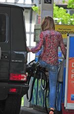 ABBIGAIL ABBEY CLANCY in Ripped Jeans at a Gas Station in London