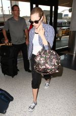 AMANDA SEYFRIED Arrives a LAX Airport