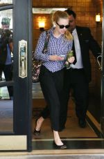 AMANDA SEYFRIED Leaves Her Apartment in New York