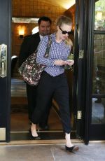 AMANDA SEYFRIED Leaves Her Apartment in New York