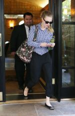 AMANDA SEYFRIED Leaves Her Apartment in New York