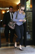 AMANDA SEYFRIED Leaves Her Apartment in New York