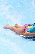 AMY CHILDS in Bikinis and Swimsuit at a Pool in UAE