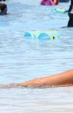 AMY CHILDS in Bikinis and Swimsuit at a Pool in UAE