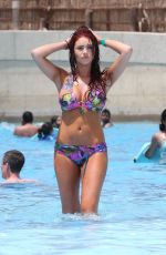 AMY CHILDS in Bikinis and Swimsuit at a Pool in UAE