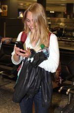 ANNASOPHIA ROBB at Dulles Airport in Washington