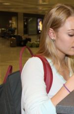 ANNASOPHIA ROBB at Dulles Airport in Washington