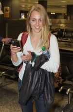 ANNASOPHIA ROBB at Dulles Airport in Washington