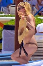 AVRIL LAVIGNE in Bikini at a Beach in Mexico