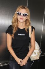 BELLA THORNE Arrives at LAX Airport in Los Angeles