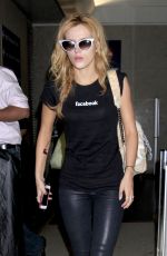 BELLA THORNE Arrives at LAX Airport in Los Angeles