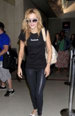 BELLA THORNE Arrives at LAX Airport in Los Angeles