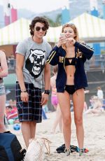 BELLA THORNE in Bikini Covered at a Beach in Santa Monica