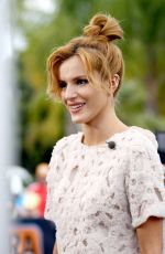 BELLA THORNE on the Set of Extra in Los Angeles