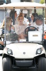 BELLA THORNE on the Set of Extra in Los Angeles