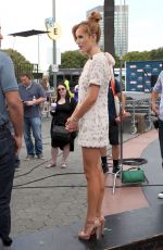 BELLA THORNE on the Set of Extra in Los Angeles