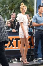 BELLA THORNE on the Set of Extra in Los Angeles