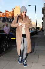 CARA DELEVINGNE Heading to Her Home with Sweet Bunny