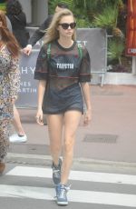 CARA DELEVINGNE Out and About in Cannes