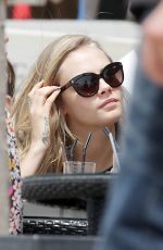 CARA DELEVINGNE Out and About in Cannes