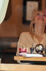 DAKOTA FANNING at Cafe Cluny in New York