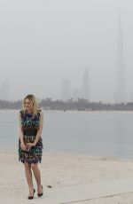 DAKOTA FANNING at Chanel Cruise Fashion Show in Dubai