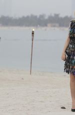 DAKOTA FANNING at Chanel Cruise Fashion Show in Dubai