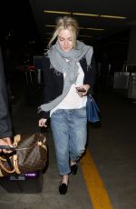 DAKOTA FANNING at LAX Airport in Los Angeles