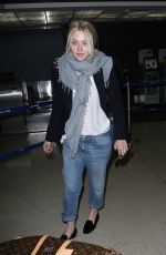 DAKOTA FANNING at LAX Airport in Los Angeles