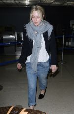 DAKOTA FANNING at LAX Airport in Los Angeles