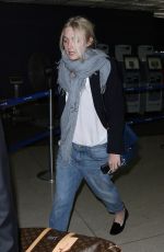 DAKOTA FANNING at LAX Airport in Los Angeles