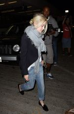 DAKOTA FANNING at LAX Airport in Los Angeles