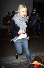 DAKOTA FANNING at LAX Airport in Los Angeles