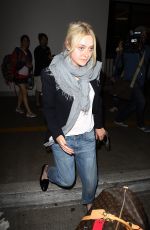 DAKOTA FANNING at LAX Airport in Los Angeles
