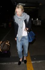 DAKOTA FANNING at LAX Airport in Los Angeles