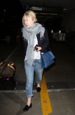 DAKOTA FANNING at LAX Airport in Los Angeles