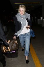 DAKOTA FANNING at LAX Airport in Los Angeles