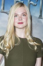 ELLE FANNING and ANGELINA JOLIE at Maleficient Photocall in Paris