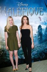 ELLE FANNING and ANGELINA JOLIE at Maleficient Photocall in Paris