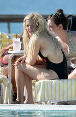ELLIE GOULDING in Bikini and Swimsuit on a Yacht in Miami