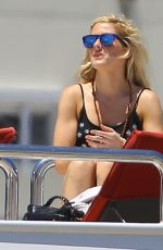 ELLIE GOULDING in Bikini and Swimsuit on a Yacht in Miami