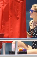 ELLIE GOULDING in Bikini and Swimsuit on a Yacht in Miami