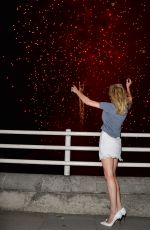 ELLIE GOULDING Watching a Fireworks Display on Waterloo Bridge in London