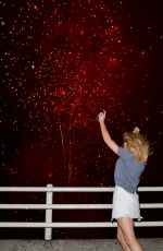 ELLIE GOULDING Watching a Fireworks Display on Waterloo Bridge in London