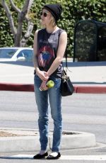 EMMA ROBERTS heading to Nine Zero One Salon in Los Angeles